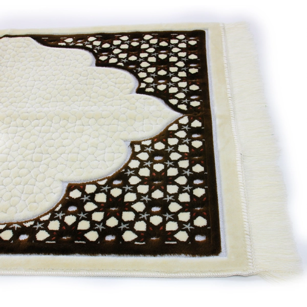 white and brown Muslim prayer mat