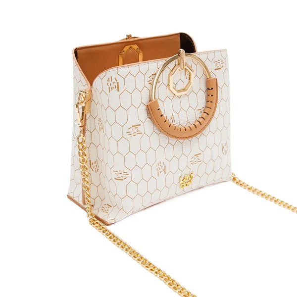 white patterned designer handbag